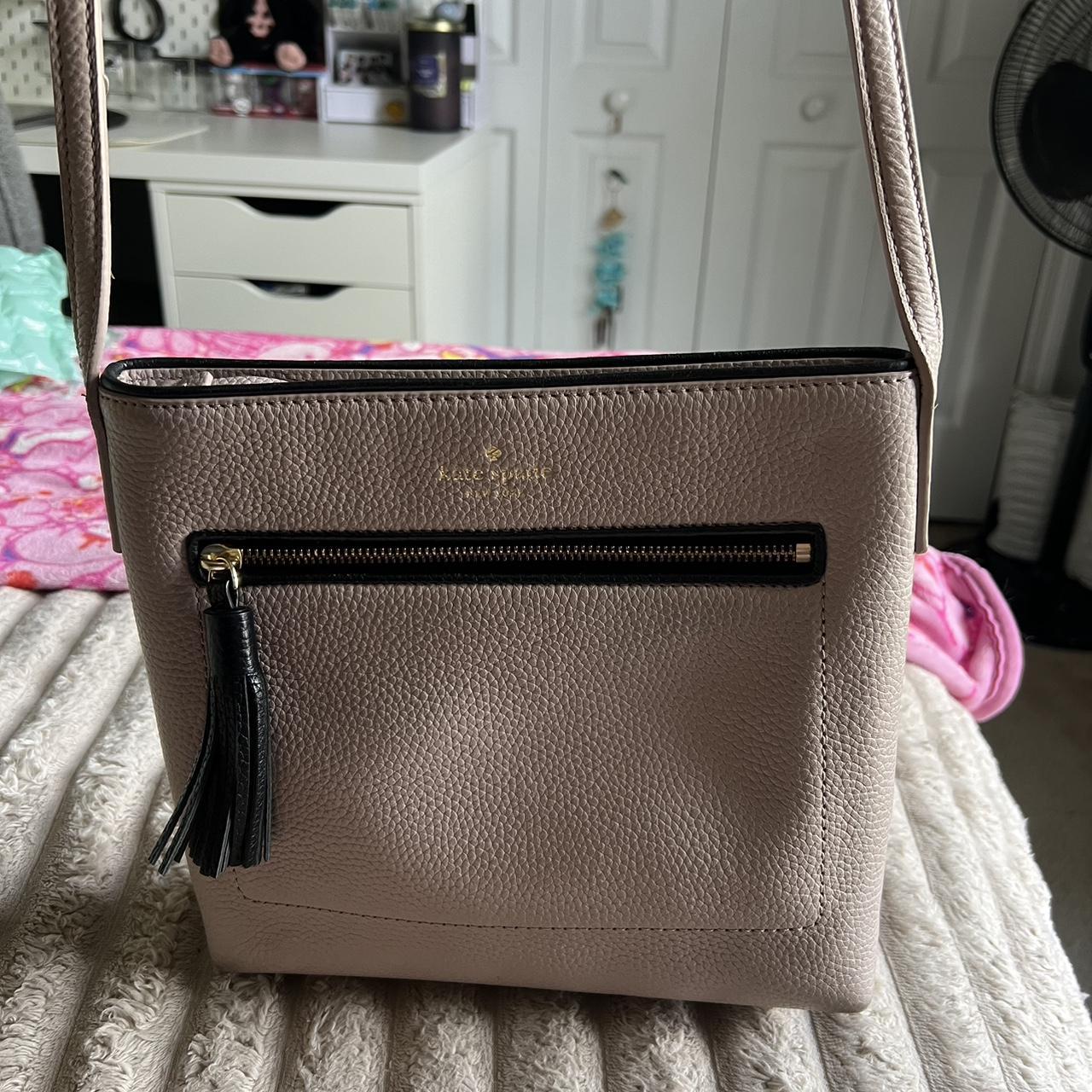 This Kate Spade crossbody handbag in tan is the