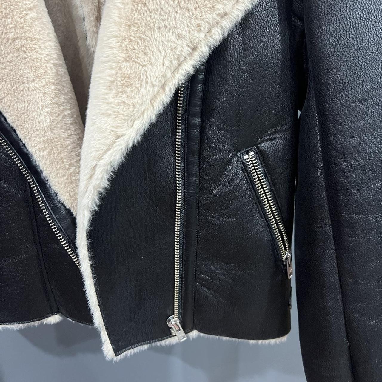 sportsgirl size 6 black leather jacket with beige... Depop