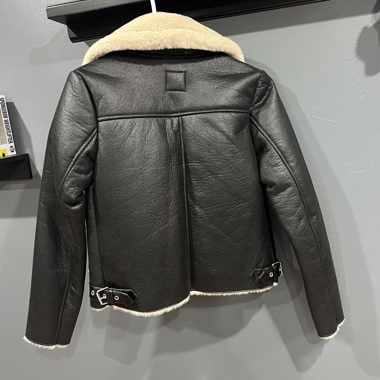 sportsgirl size 6 black leather jacket with beige... Depop