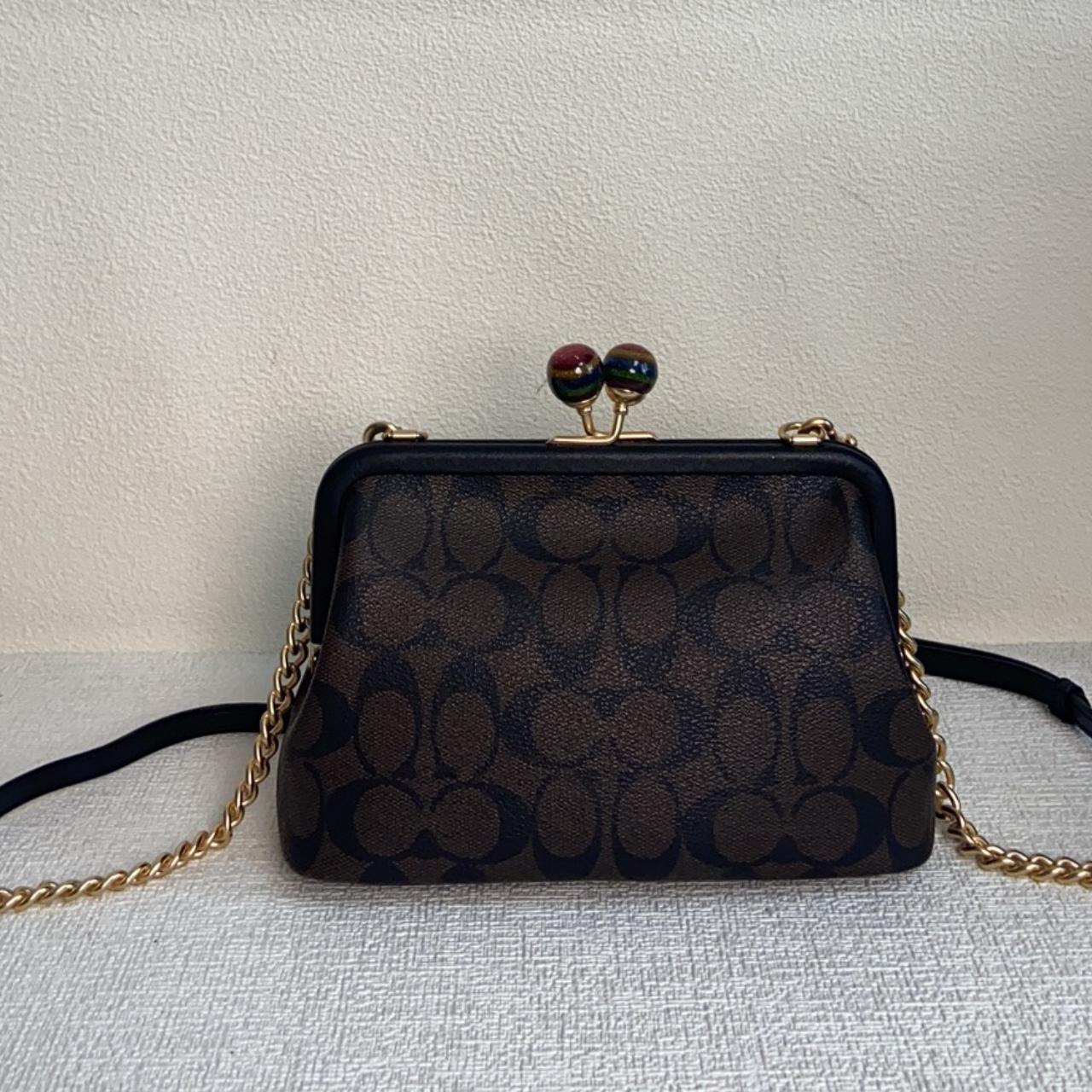 Nora Kisslock Crossbody In Signature Canvas Depop