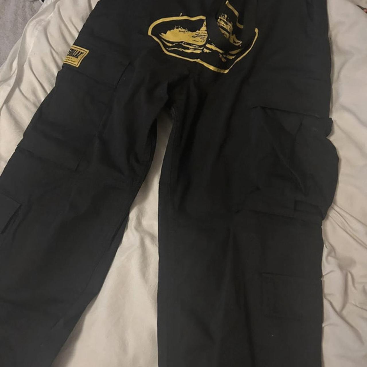 Black and yellow cargo pants