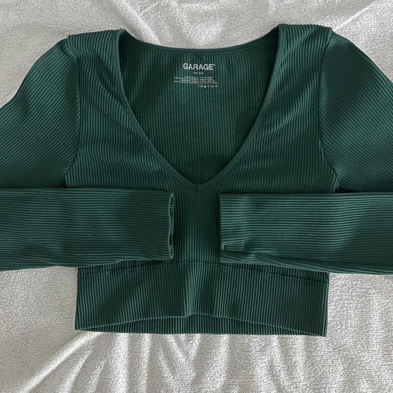 Dark green Garage crop top! Size XS but can also fit... Depop