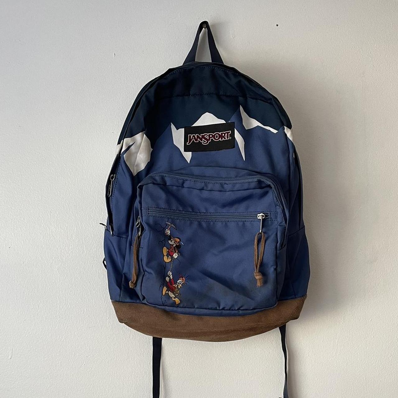 Jansport x Disney blue and brown backpack with a. Depop