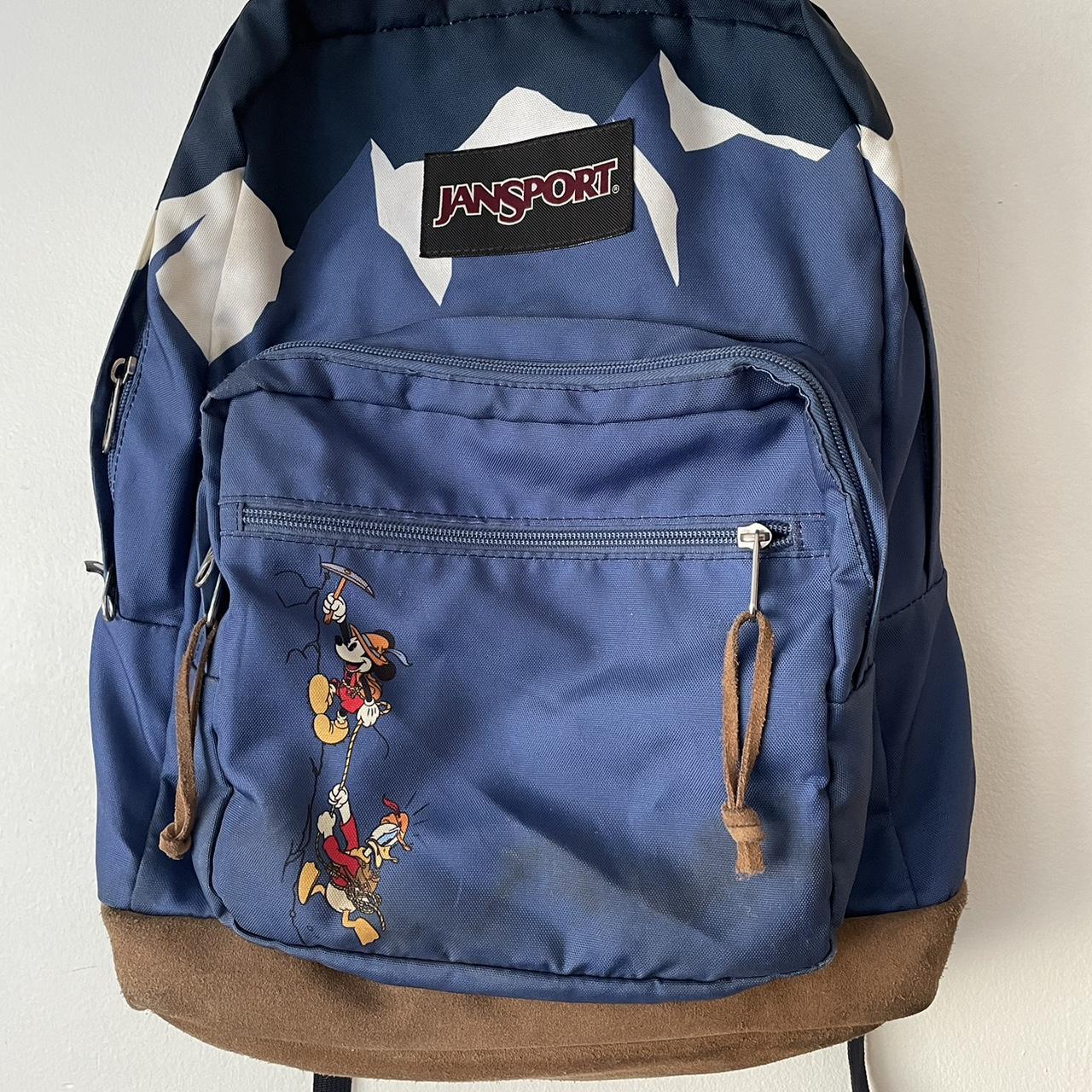 Jansport x Disney blue and brown backpack with a. Depop