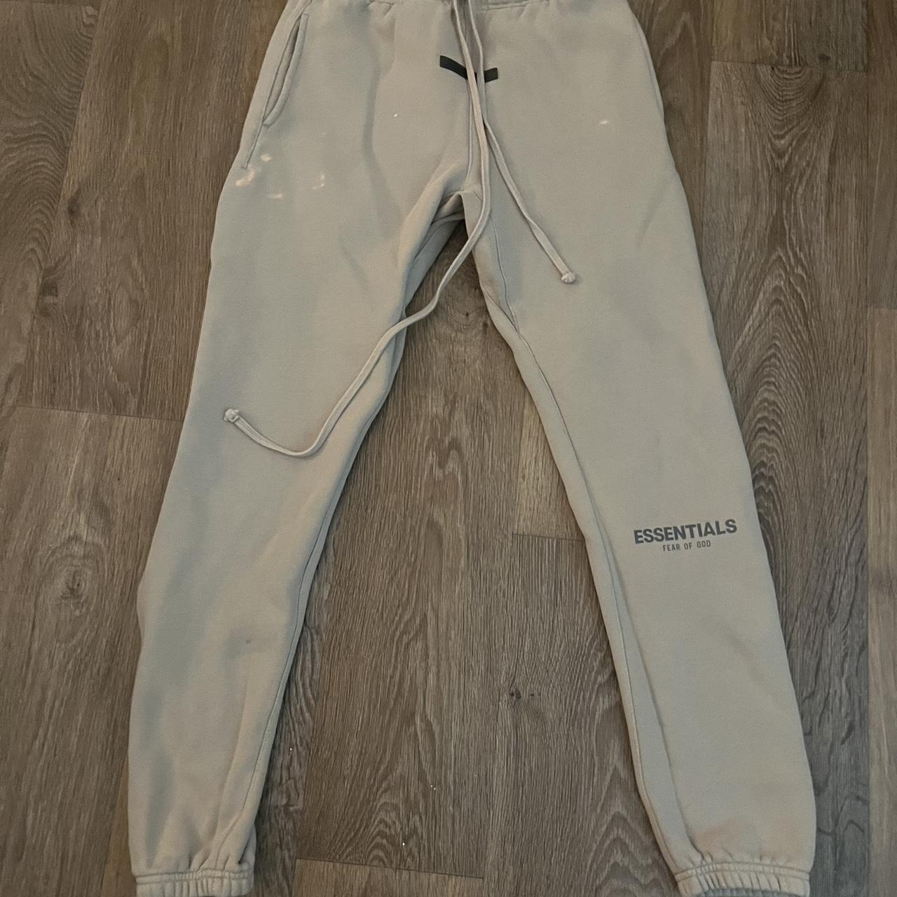 Essentials sweats. Small bleach stains, but it makes... - Depop