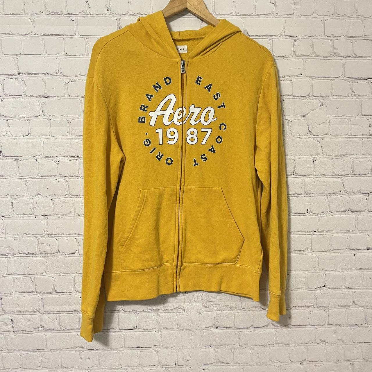 Aeropostale yellow and black hoodie. Size M Depop