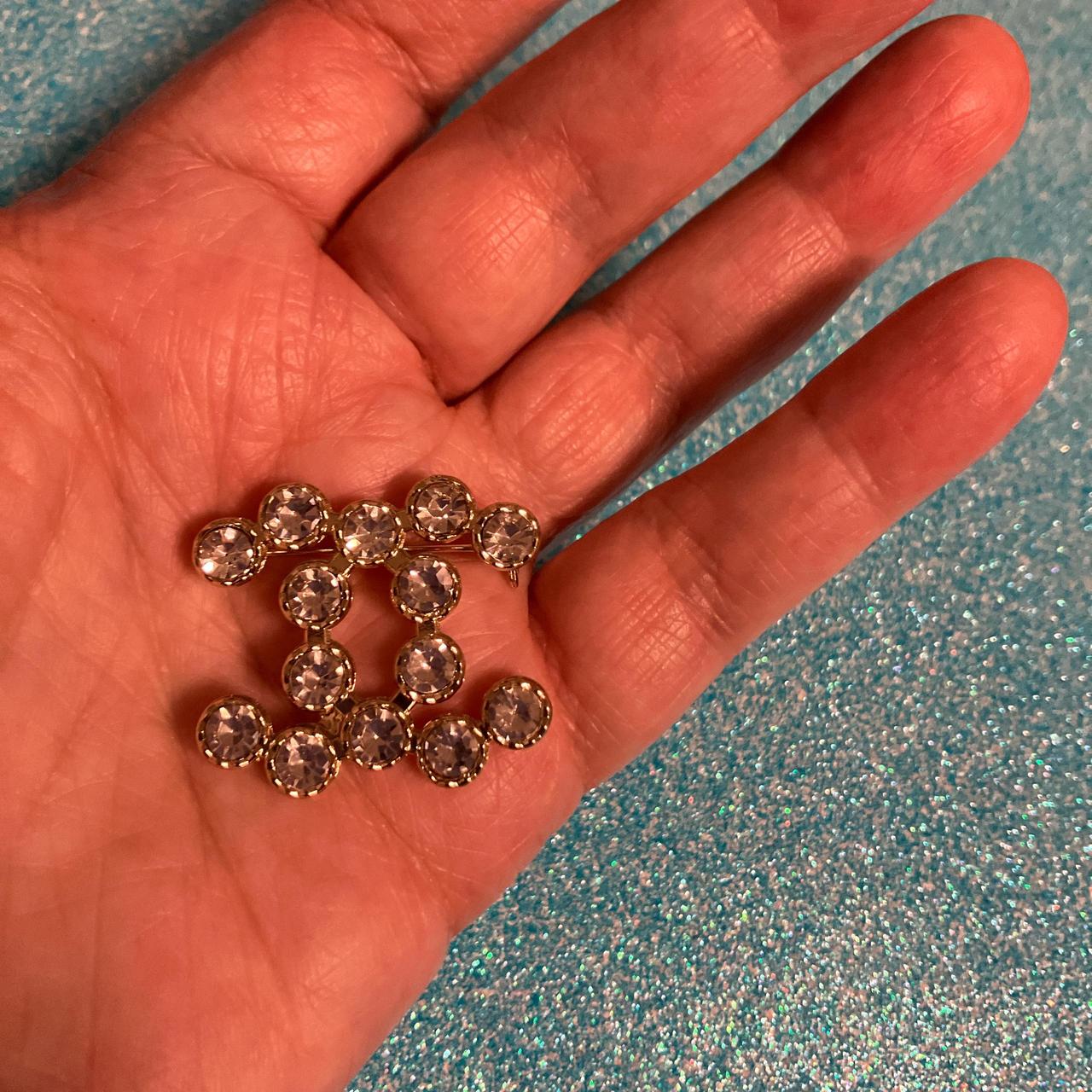 Pretty cc gold and crystal brooch. Very sparkly! - Depop