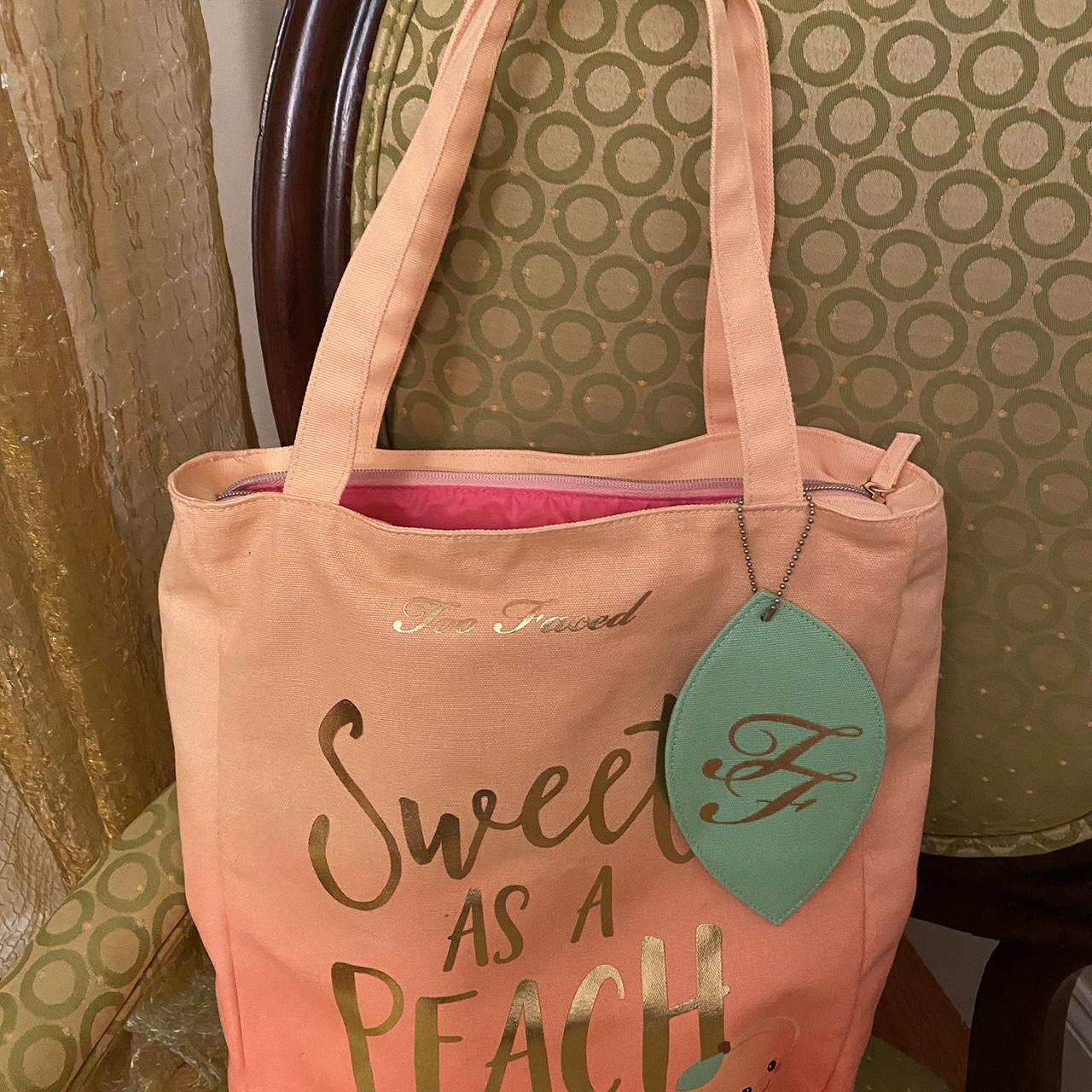 Sweet as a peach tote Too Faced bag in pink and