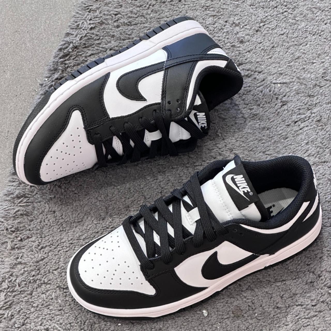 stock x black and white dunks