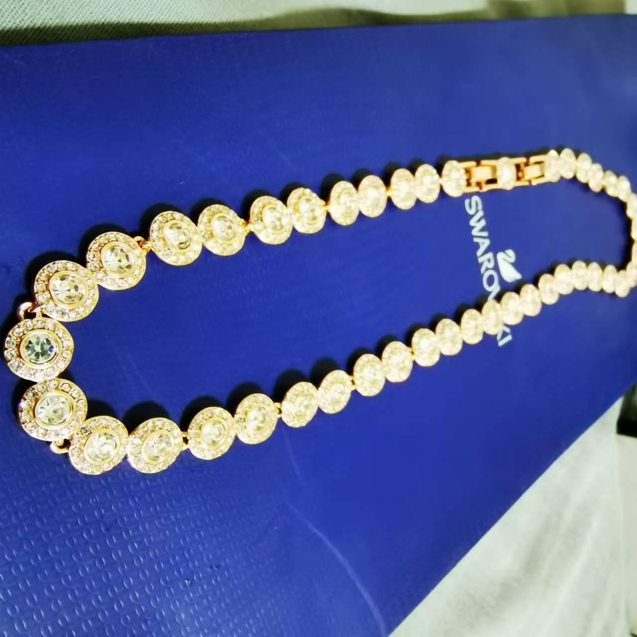 Swarovski necklace 38cm40cm Color Gold intact and... Depop