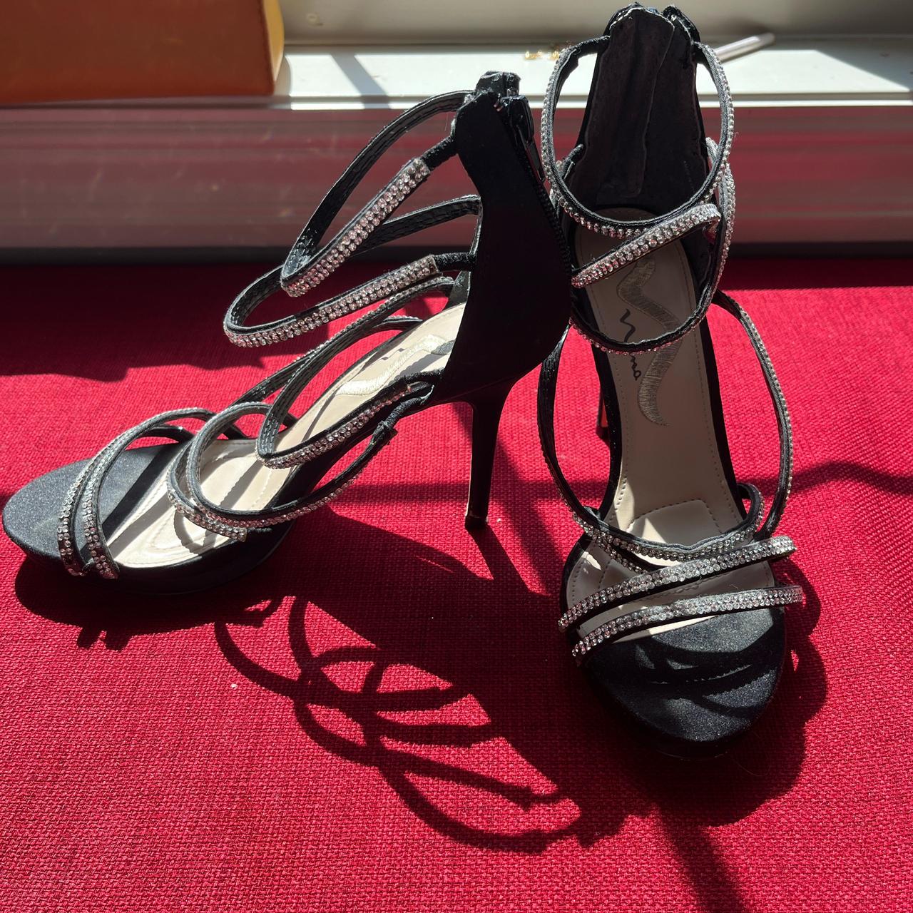 Sparkly Black Heels in a size 1/2 About Depop