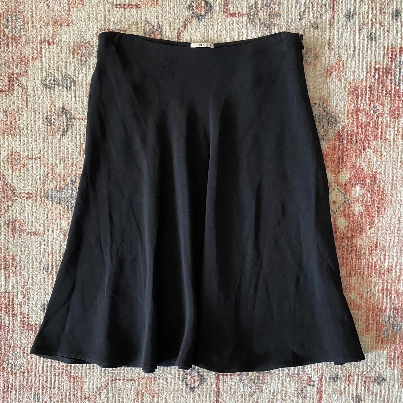 miu miu black midi skirt. size 40 best fit for a. Depop