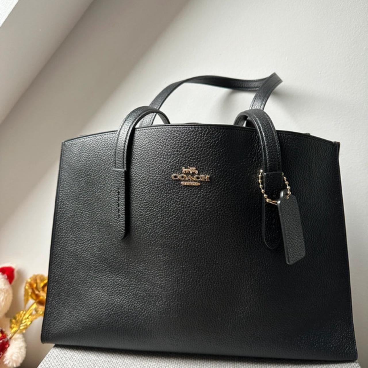 Coach charlie carryall black on sale