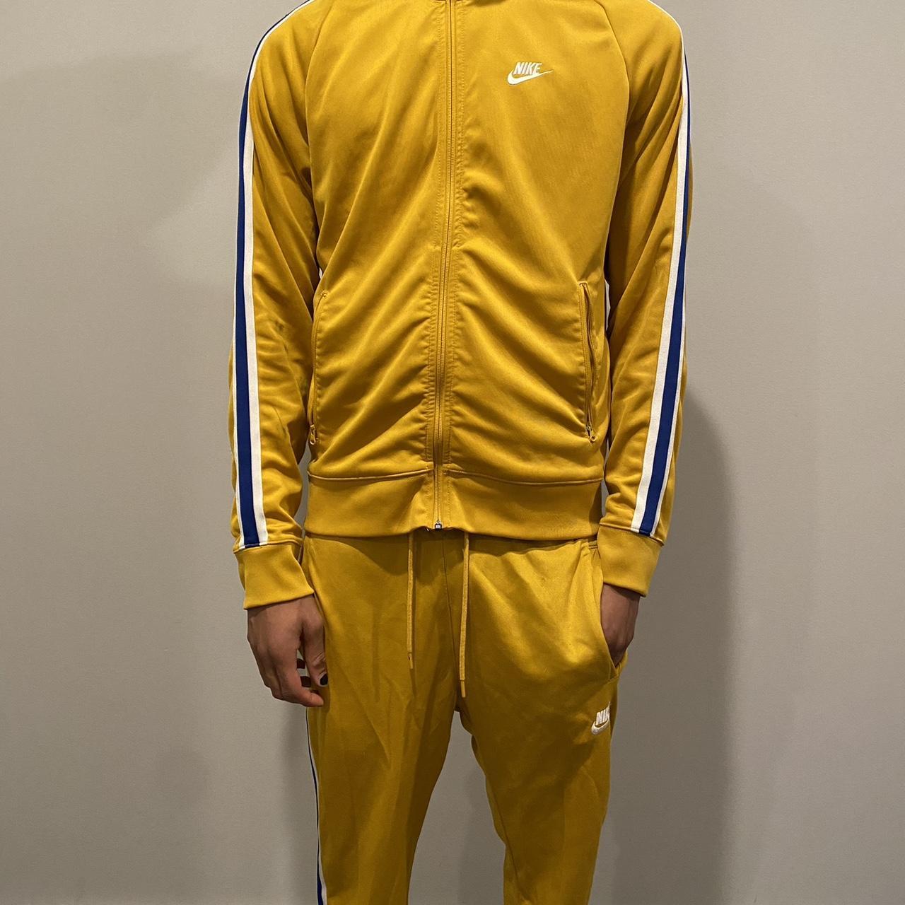 Nike shops yellow jumpsuit