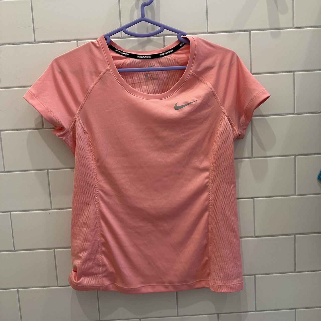 Salmon pink nike running t shirt Size S fits. Depop