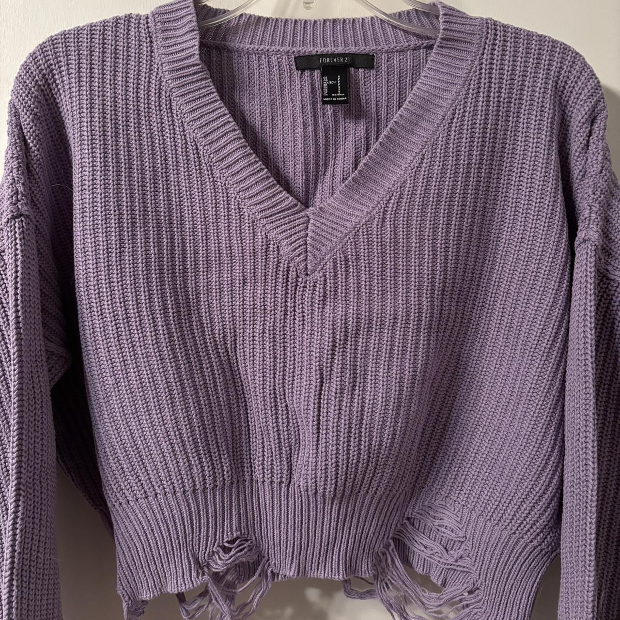 Ripped purple sweater Barely worn great. Depop