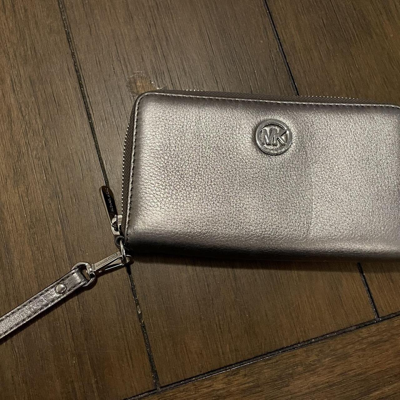 Michael Kors Wallet with wristlet strap. Silver in. Depop