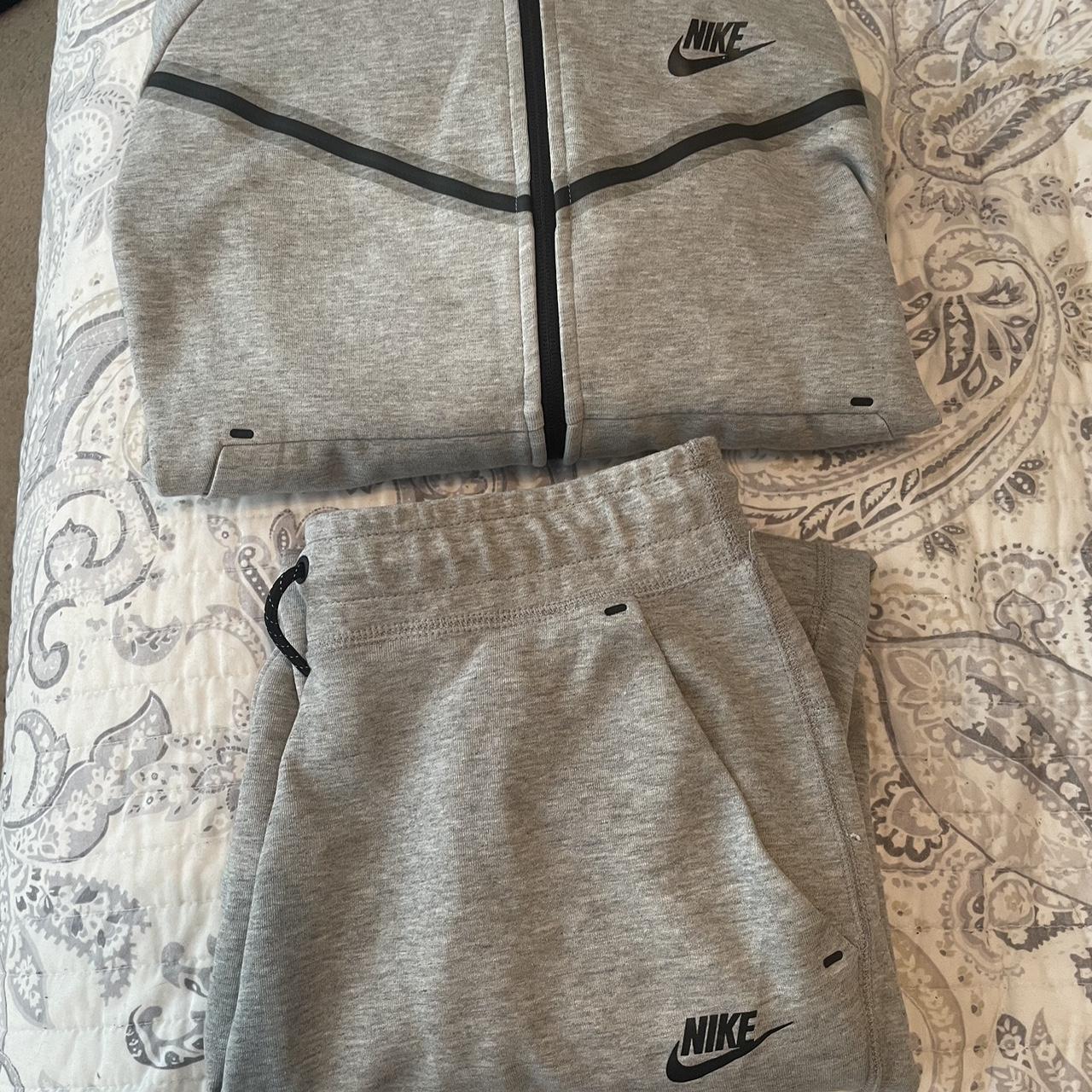 nike tech jumpsuit womens