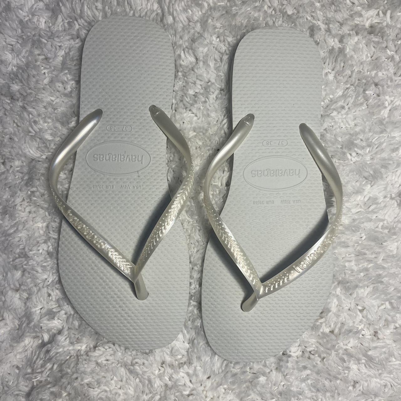 white Haviana flipflops, barely worn, very good... - Depop