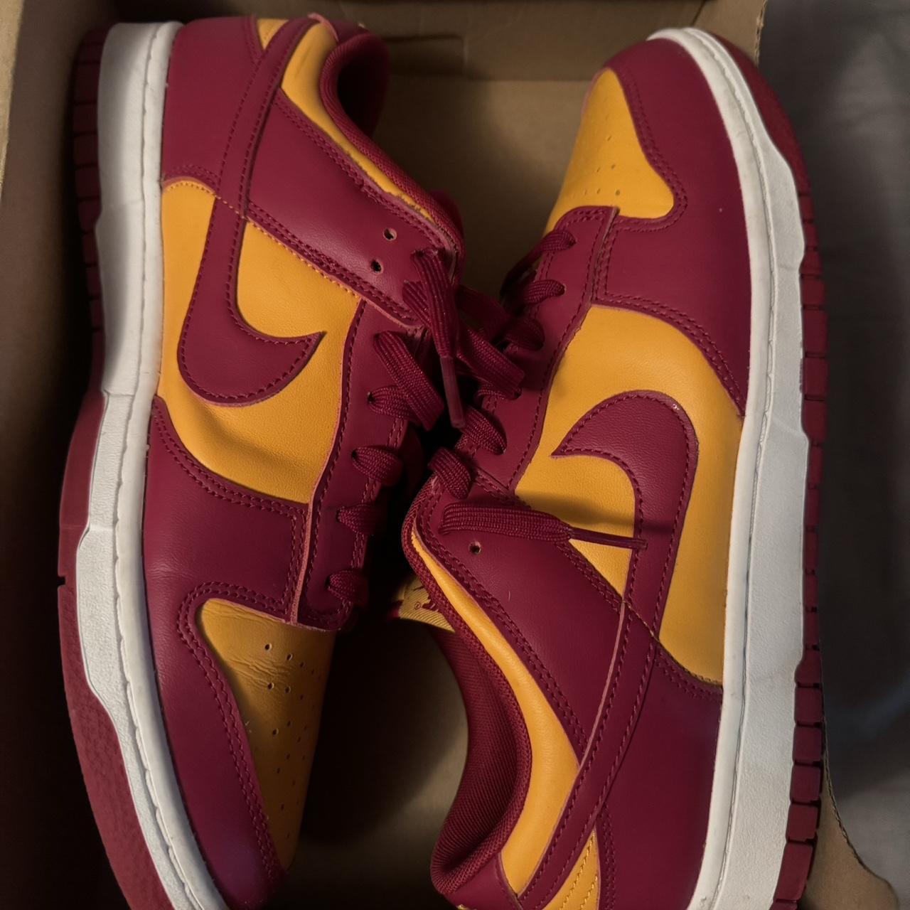 burgundy and yellow nike