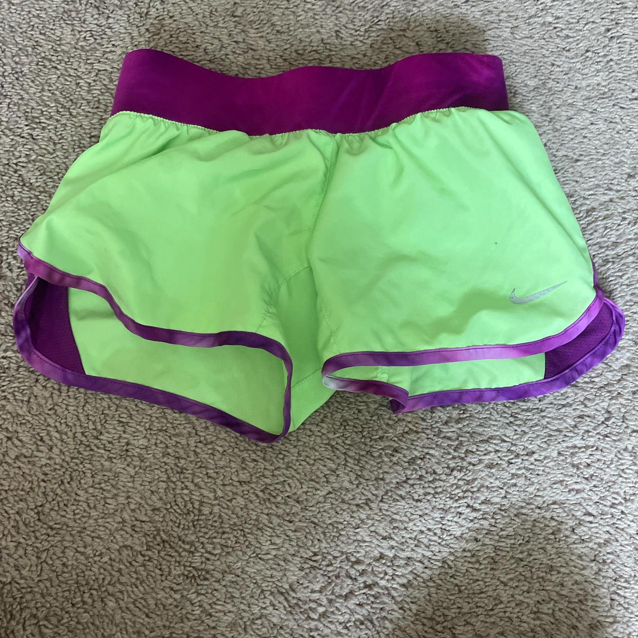 purple and green nike shorts