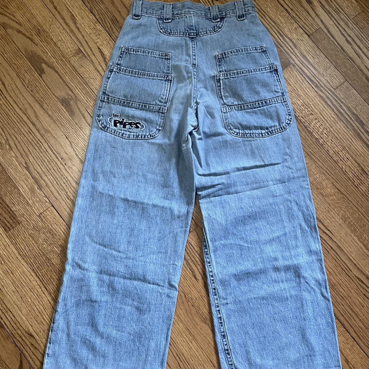 Vintage Lee Pipes Blue baggy jeans with a small tear... - Depop