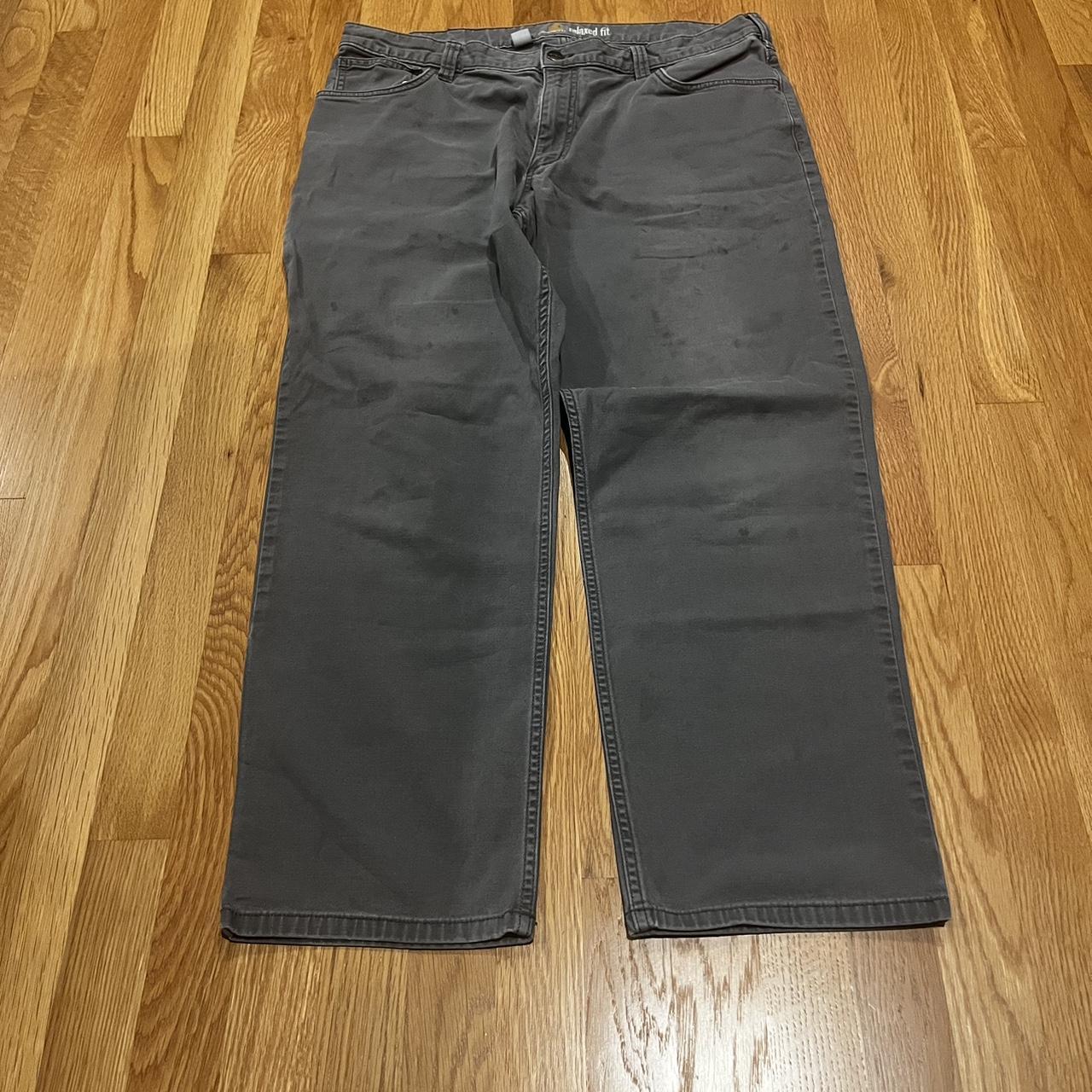 CARHARTT. Dirt and work stains. Grey work pants,... - Depop