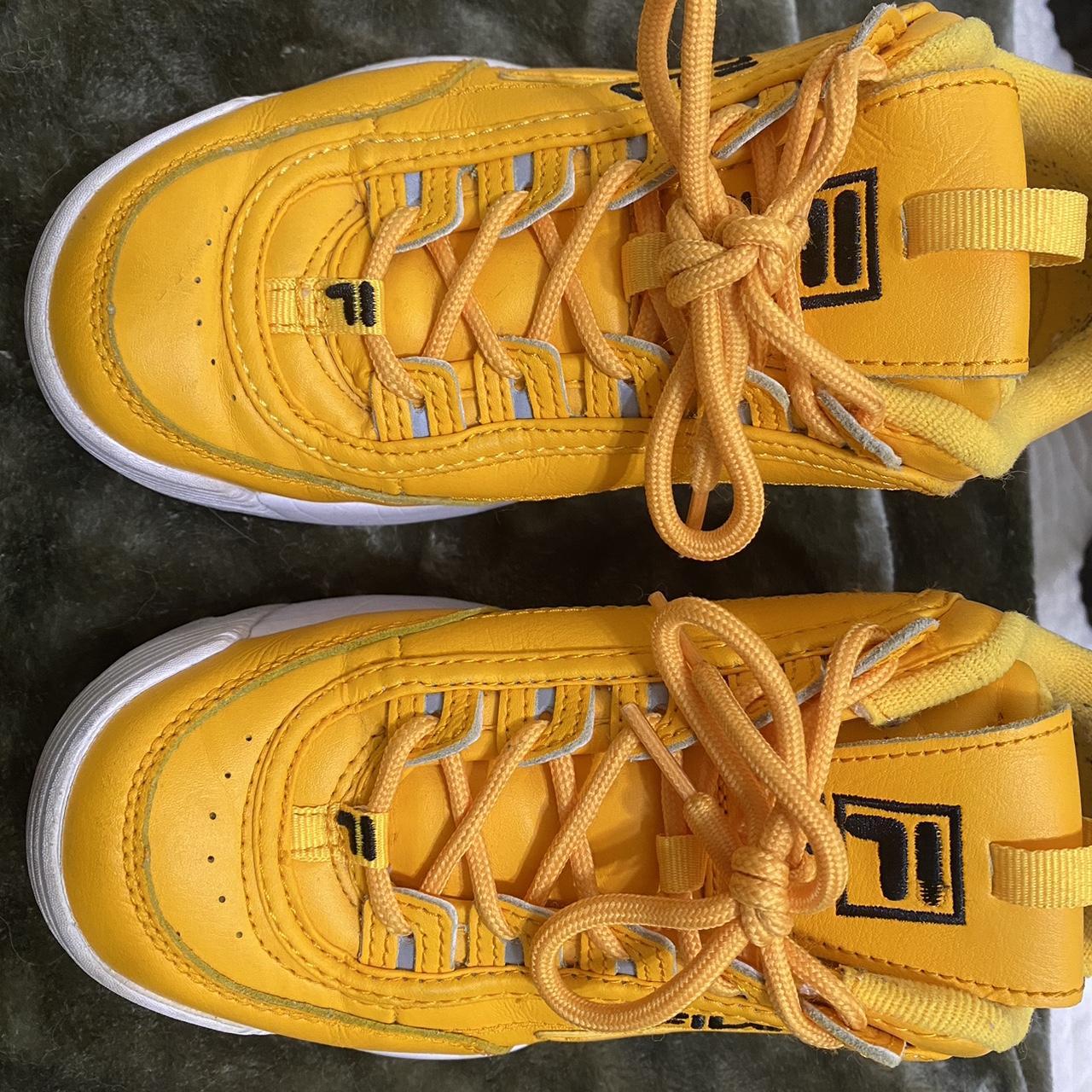 Mustard yellow fila tennis shoes. Size 7. Depop