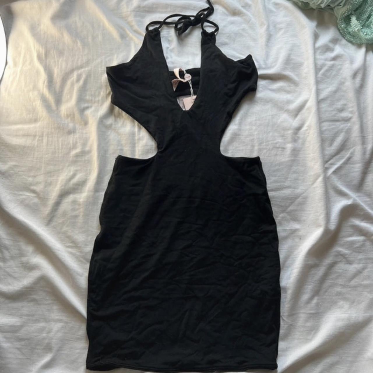 Oh Polly Black Halter-Neck Cut Out Mini Dress in... - Depop