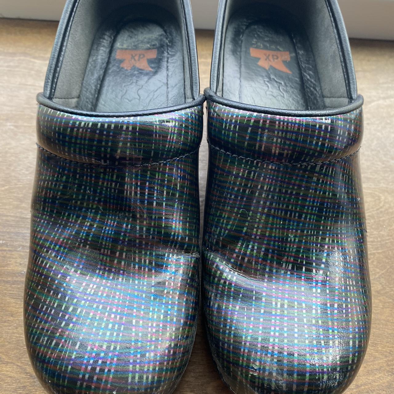 Dansko black and multi coloured plaid clogs. Depop