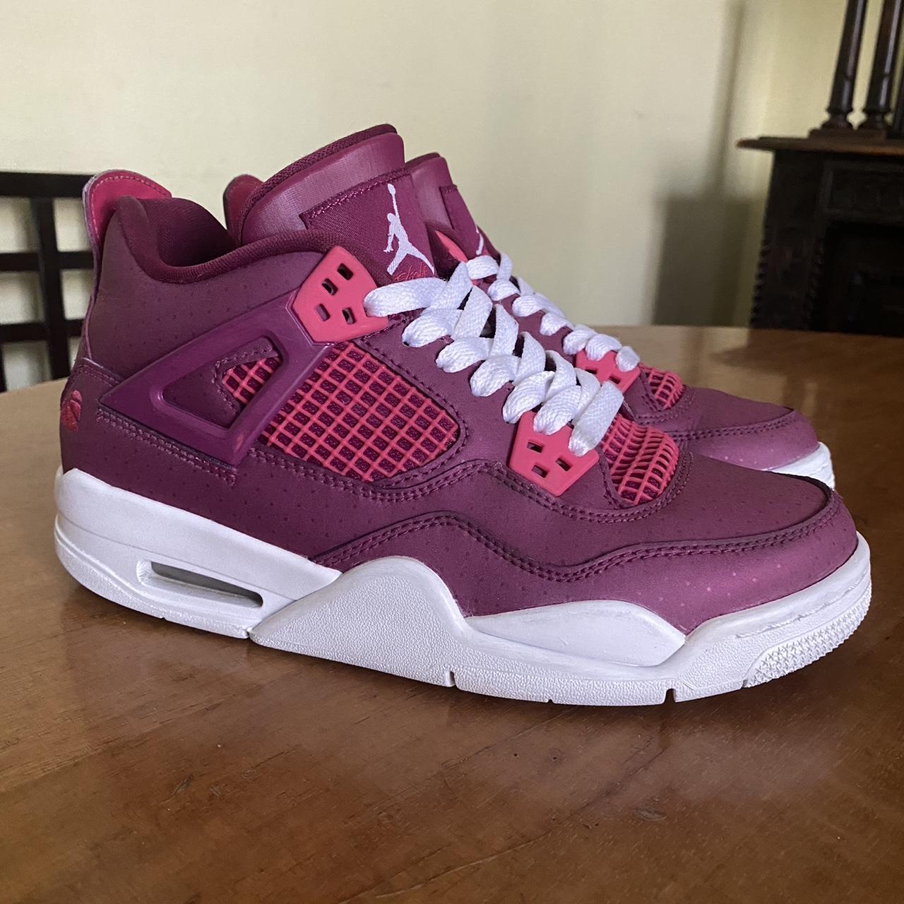 Pink jordan retro 4 hotsell