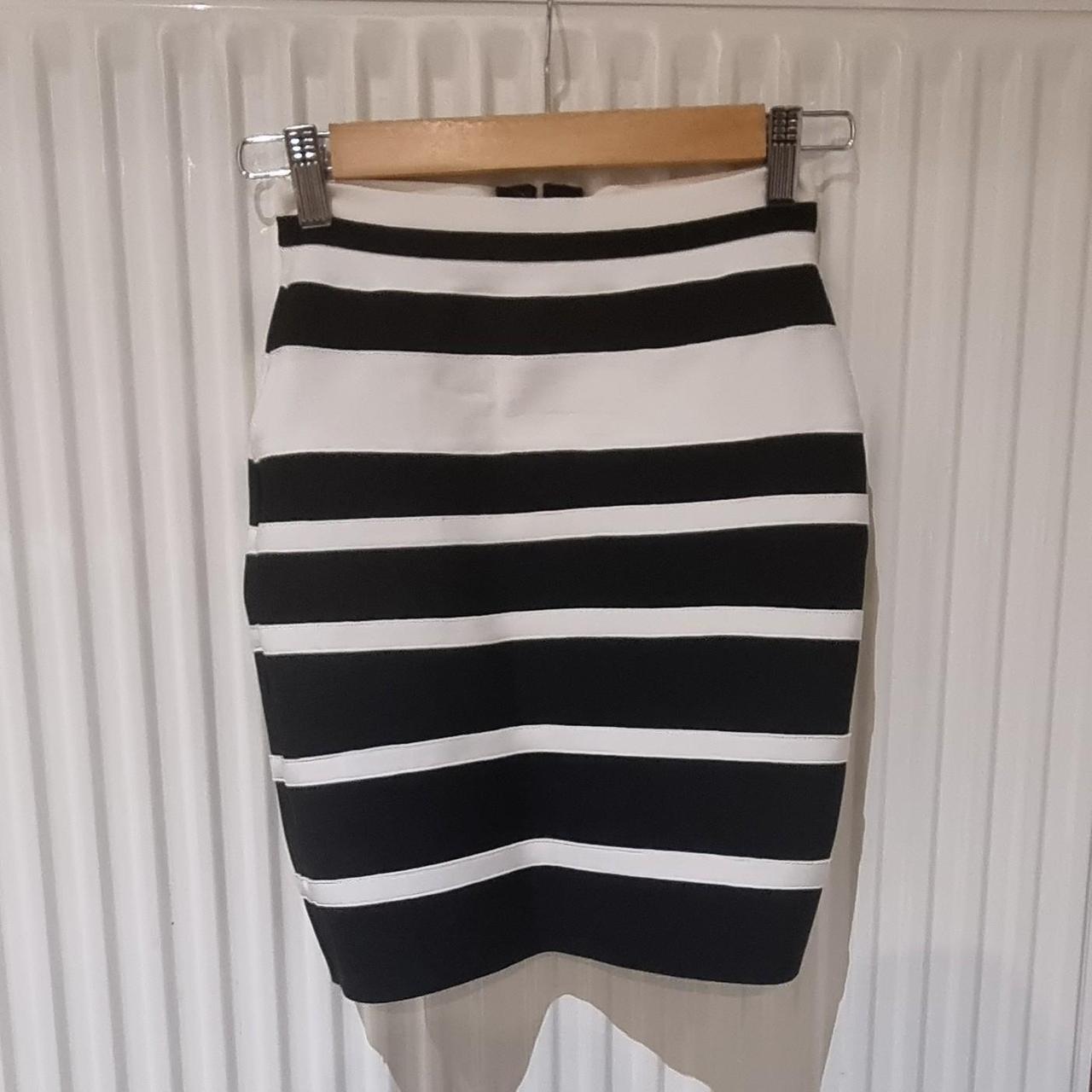 Striped bodycon mini skirt in black and white. Thick. Depop