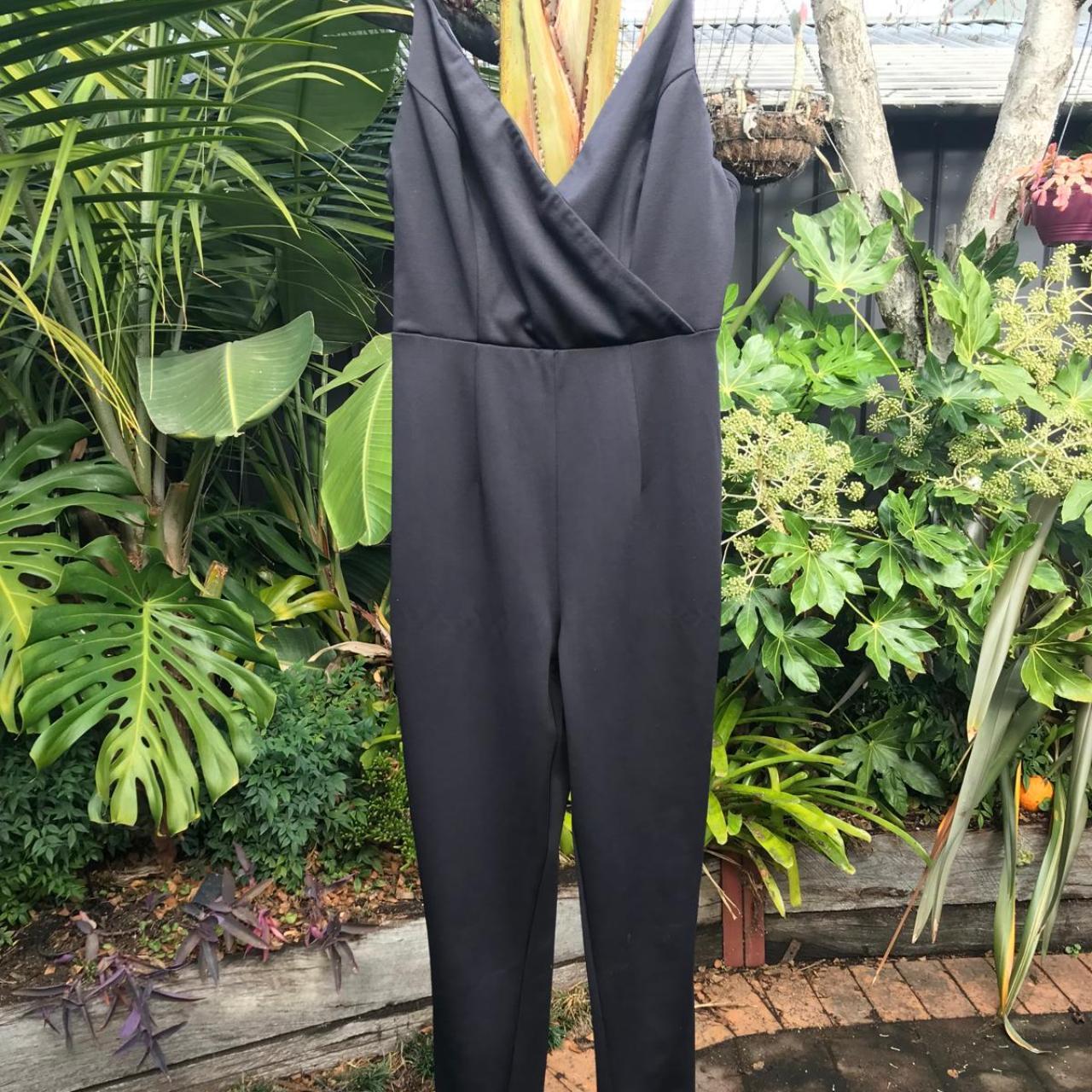 Black skinny jumpsuit - Depop