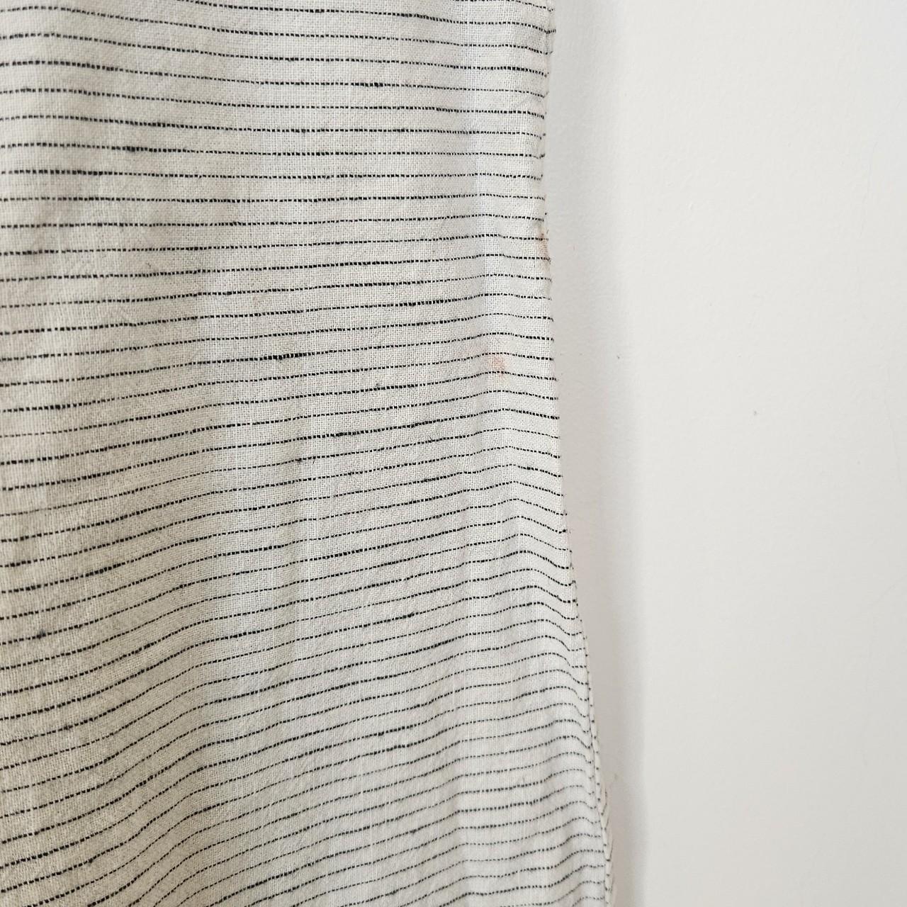 Midi length cream skirt from Zara with navy... Depop