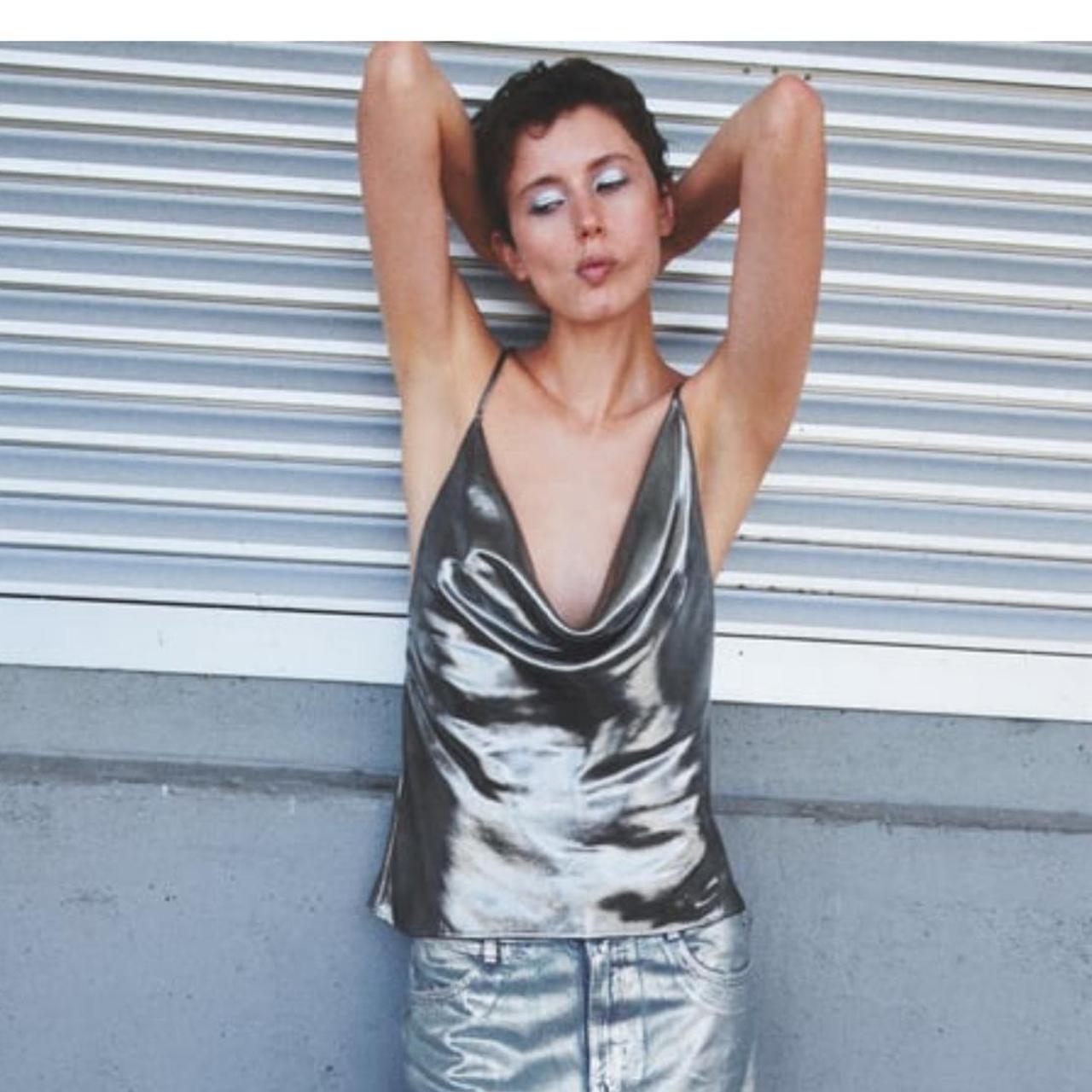Silver metallic cowl neck top with a cowl neckline | Depop