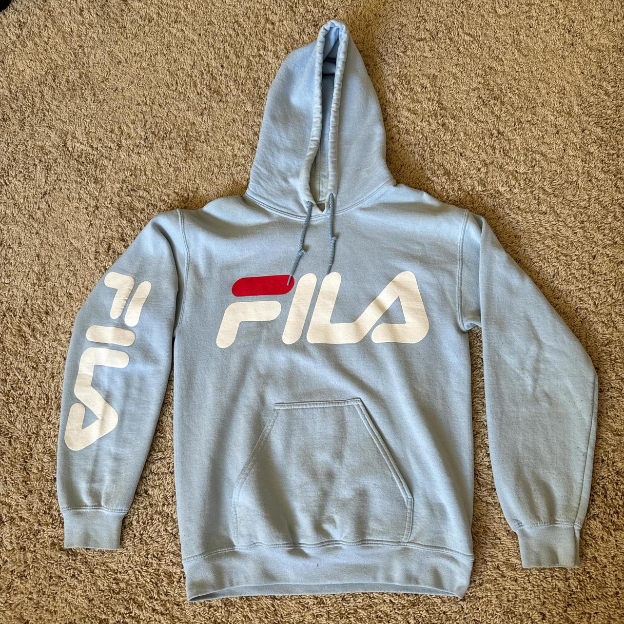 Light blue Fila hoodie slight stains across chest. Depop