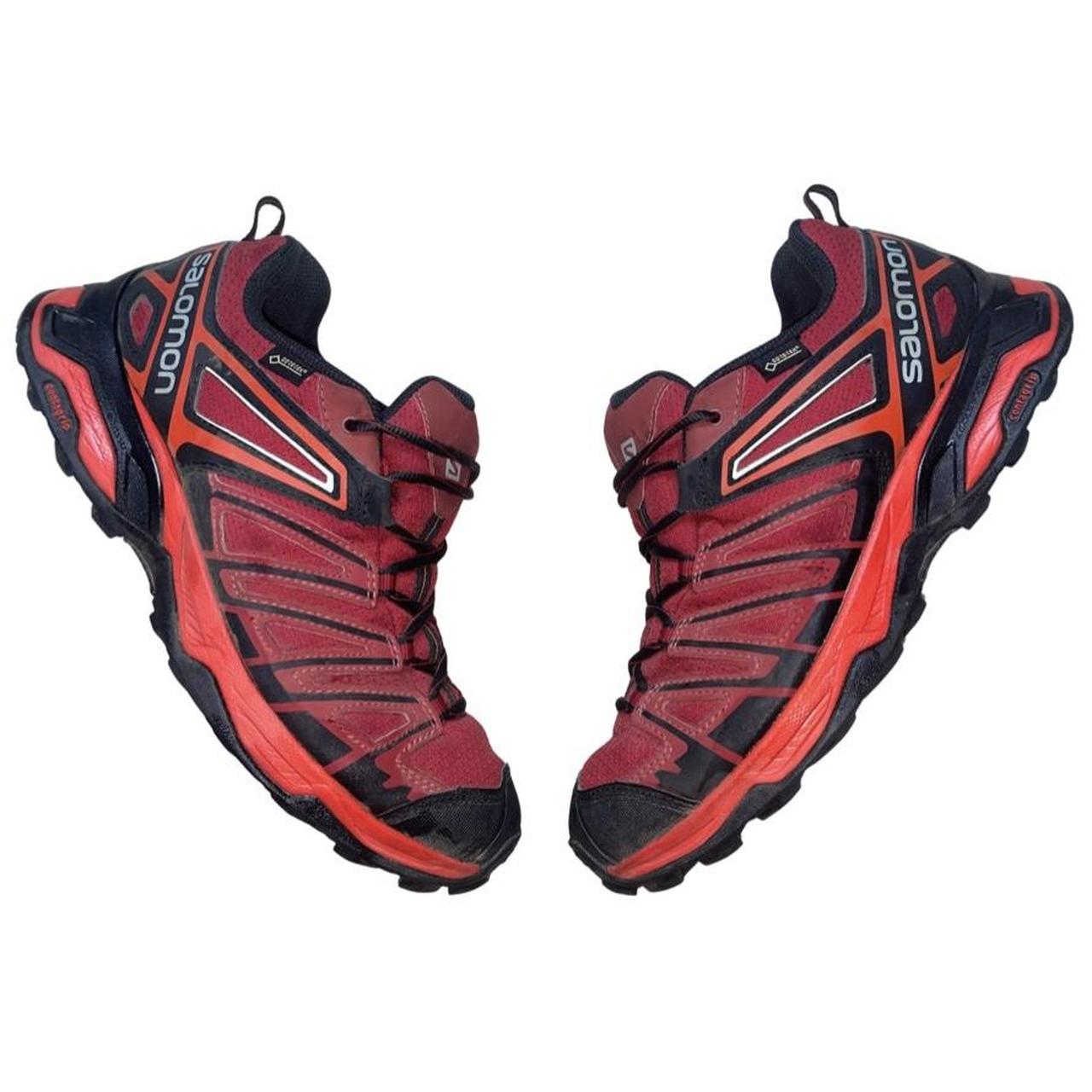 salomon red trainers