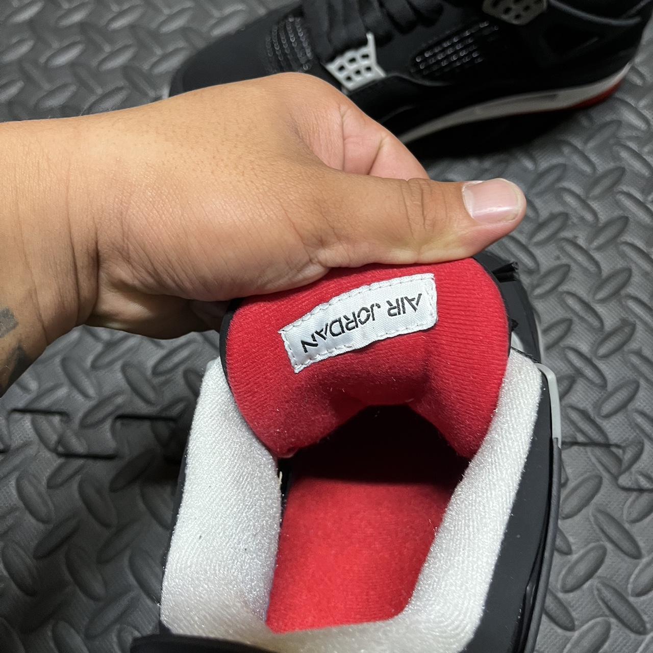 jordan 4 bred tag