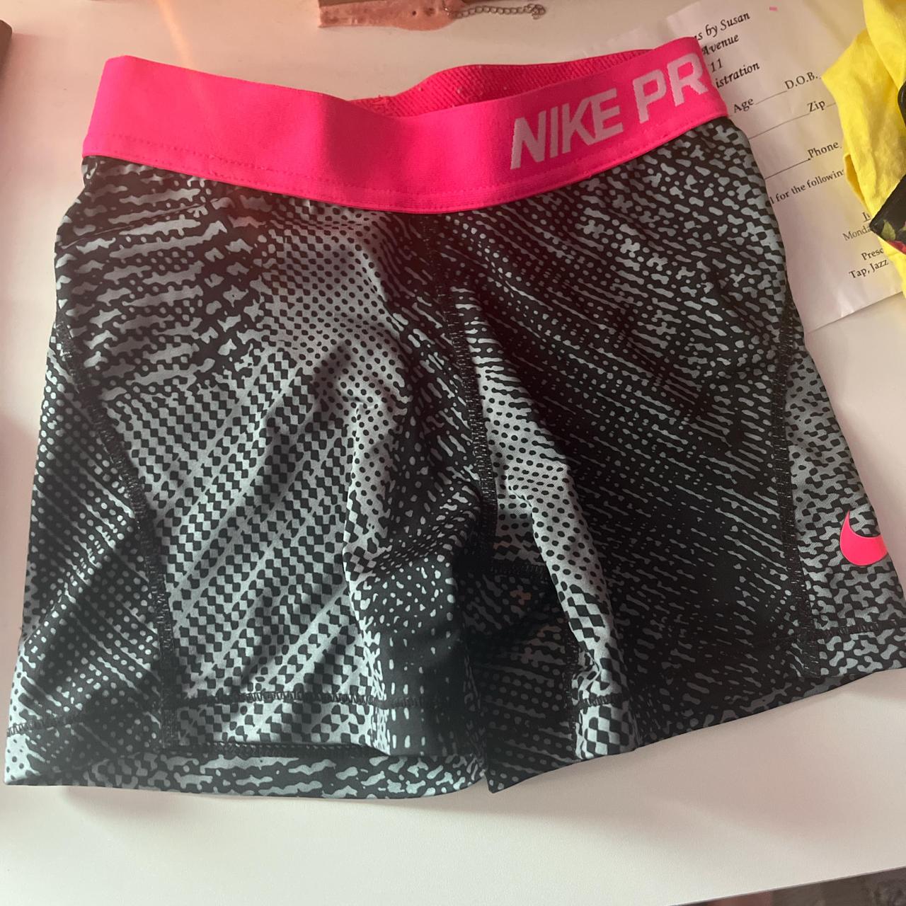 nike pro shorts grey and pink