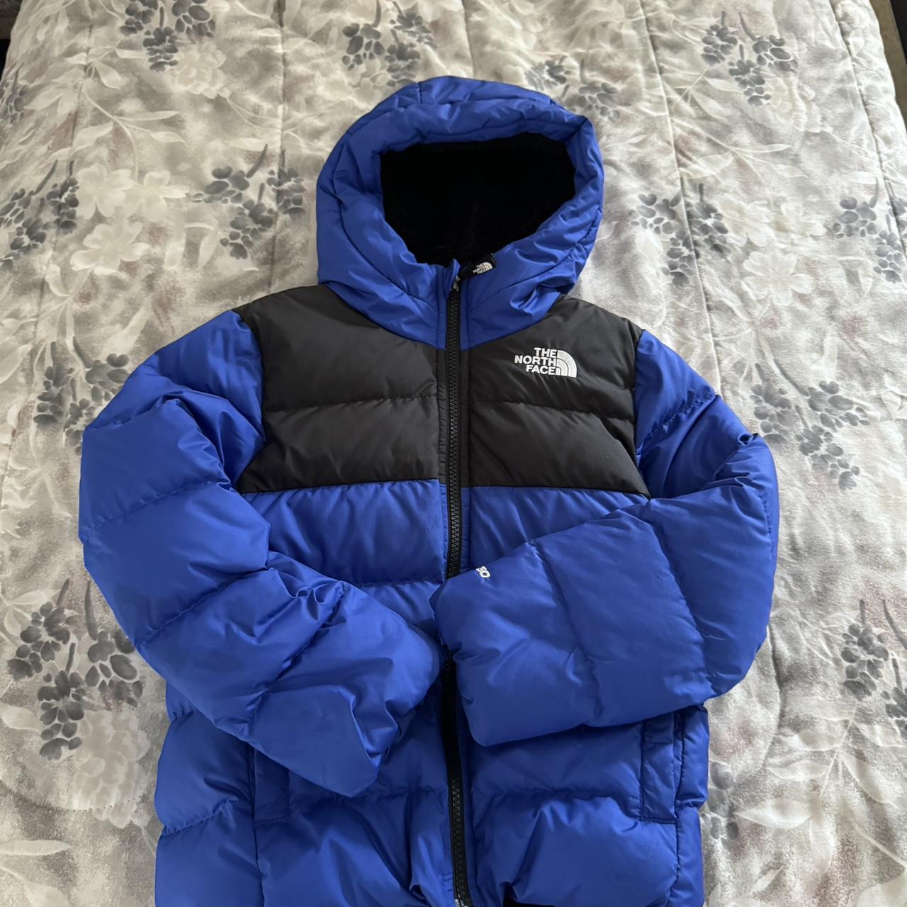 The North Face blue and black kids puffer jacket