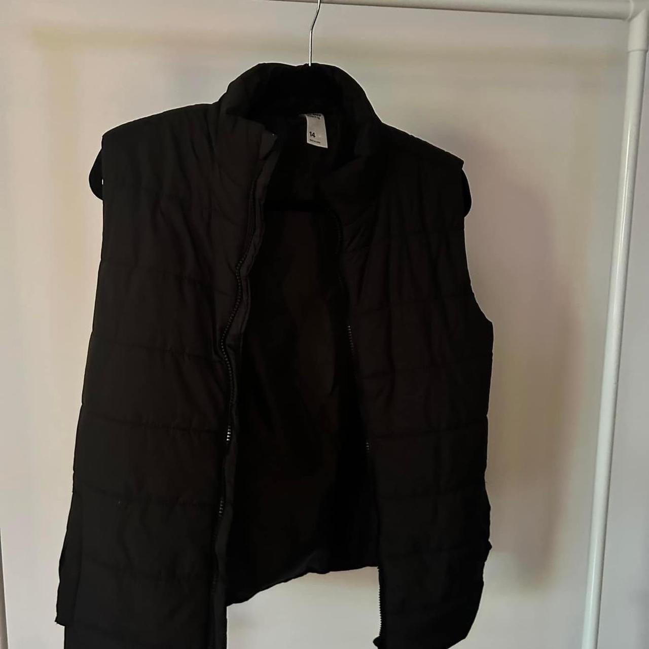 Kids Kmart Black Puffer Vest. Size 14 Kids would fit