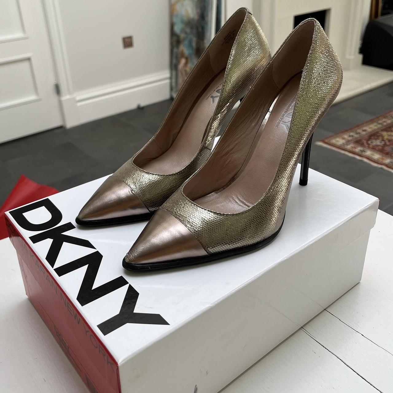 DKNY Bronze and Gold Heels Worn twice still in box. Depop