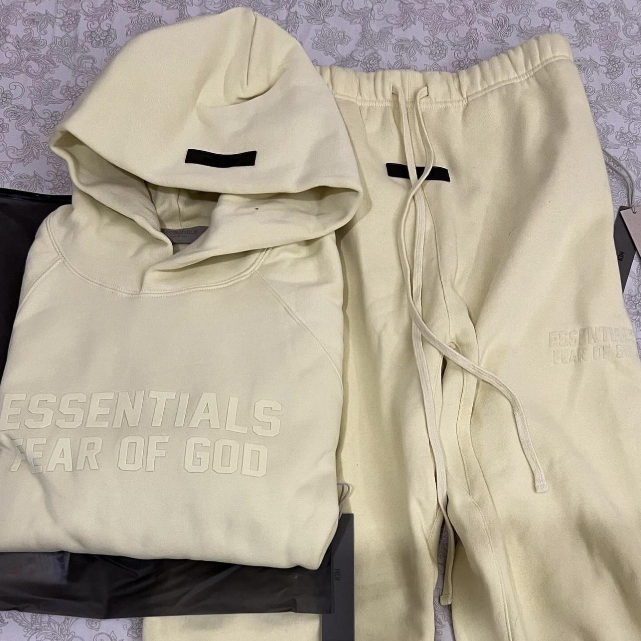 Essentials Yellow Raglan Hoodie Size: XL... - Depop