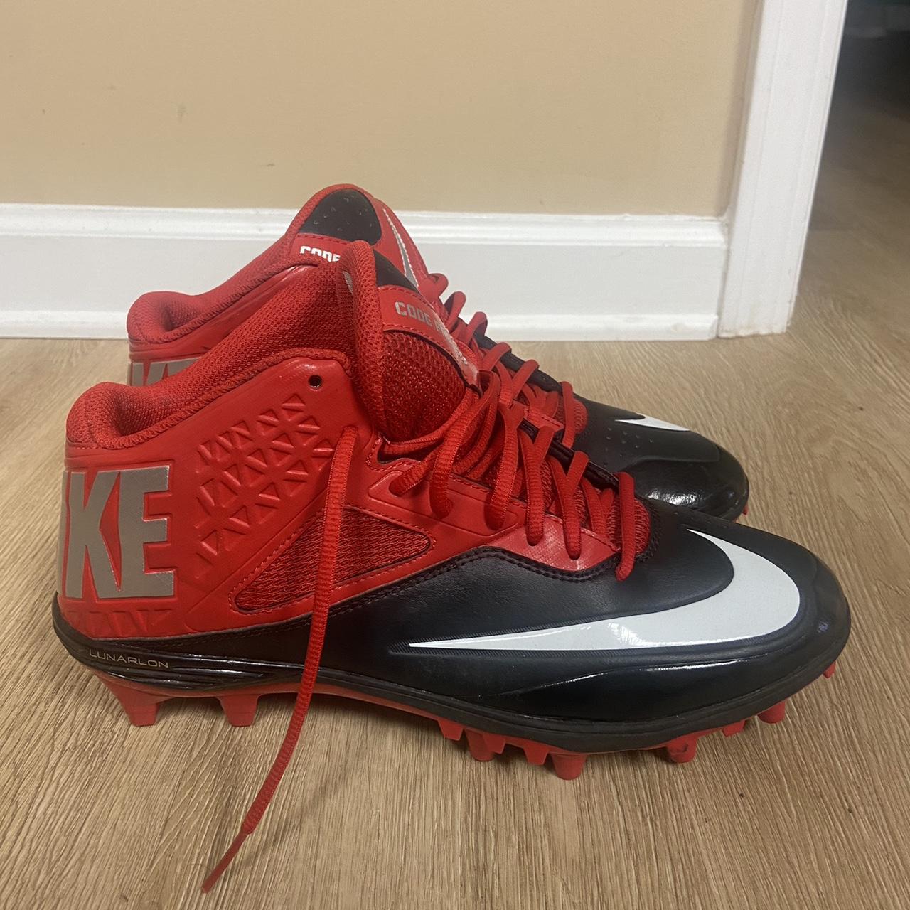 Nike football cleats red and black best sale