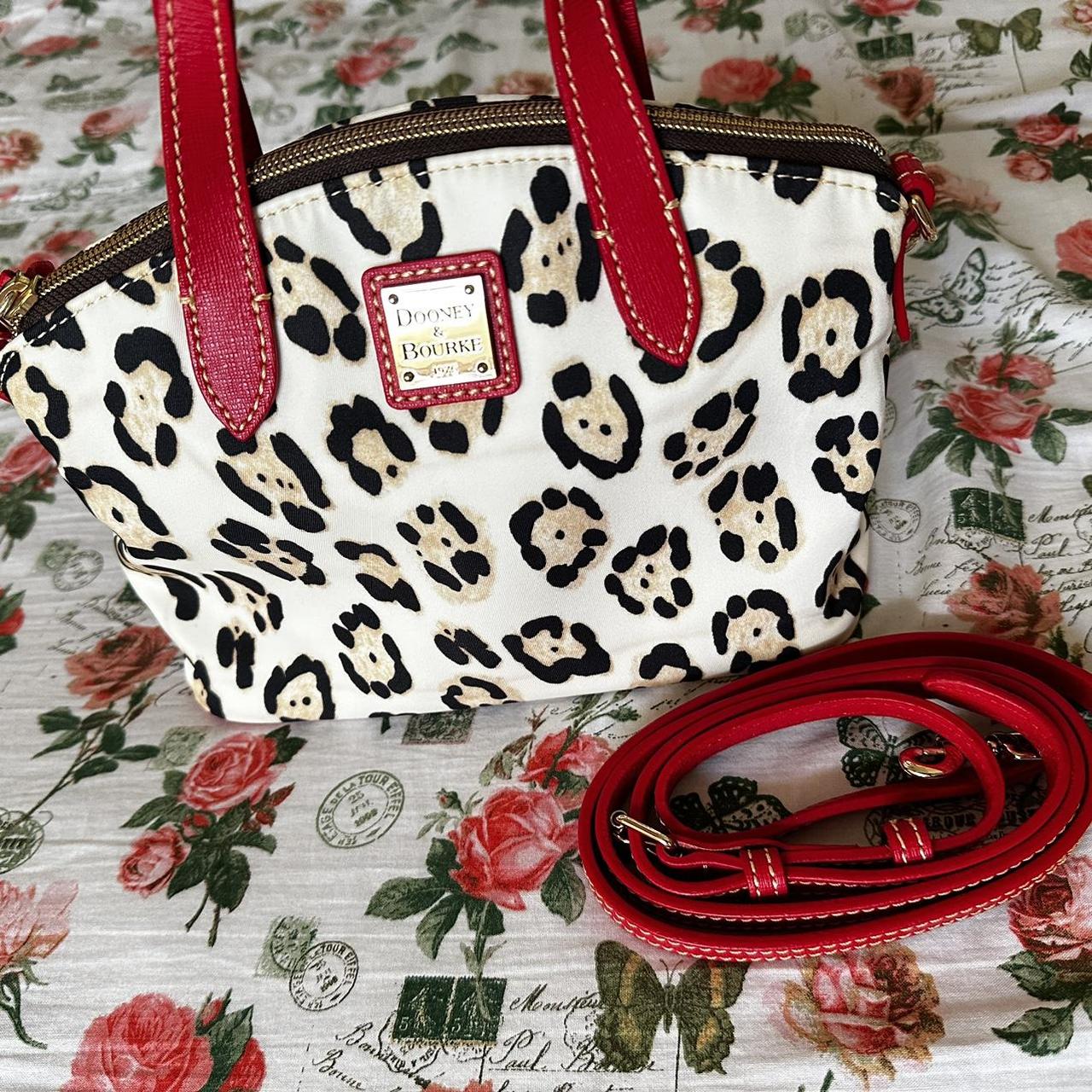 Dooney Bourke leopard print purse with red