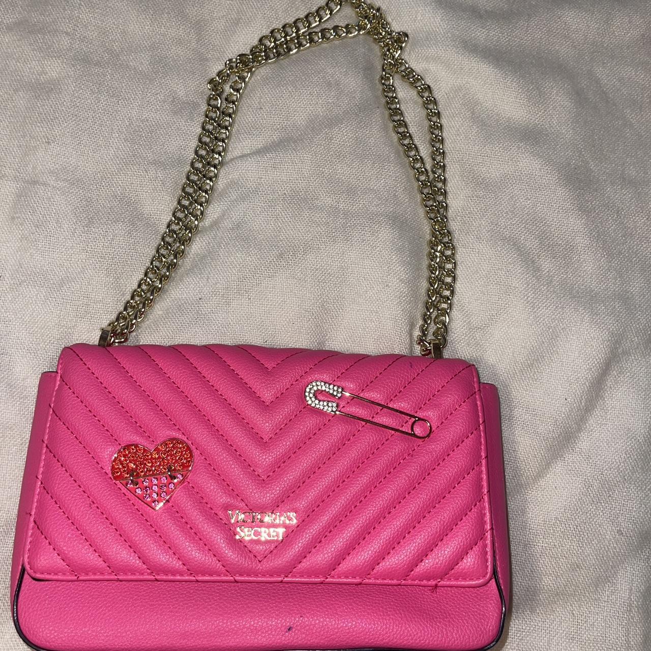 Victoria's Secret pink crossbody bag with a heart... | Depop, image size:1280x1280