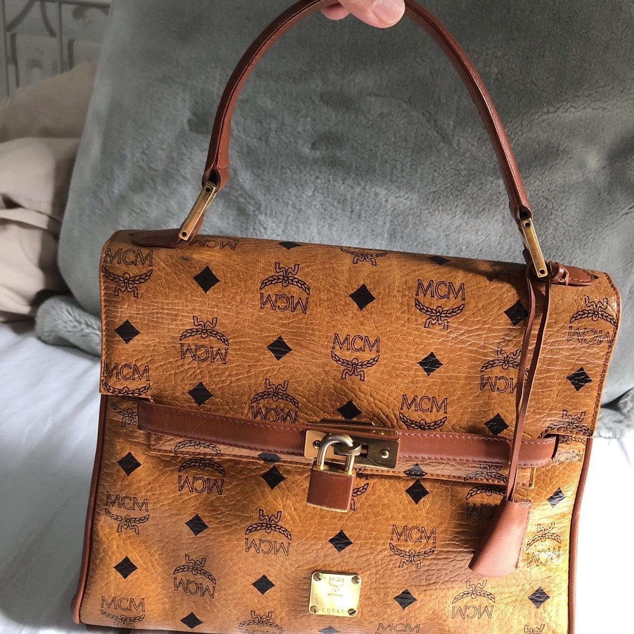 mcm handbag in good used condition its vintage... - Depop