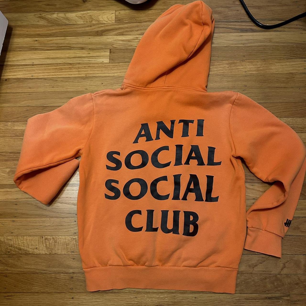 asss x undefeated paranoid orange hoodie Depop