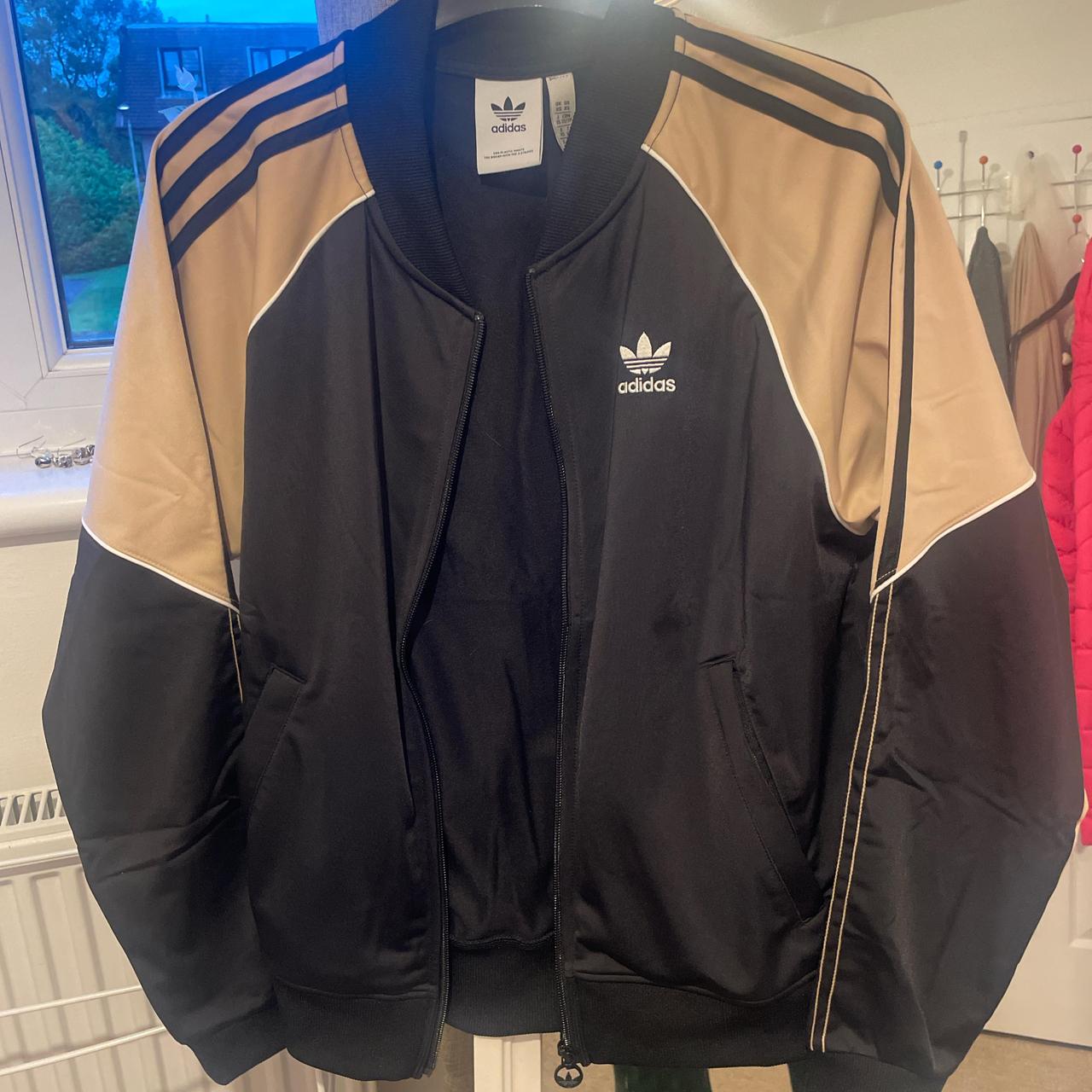 Black and gold adidas tracksuit size small I am