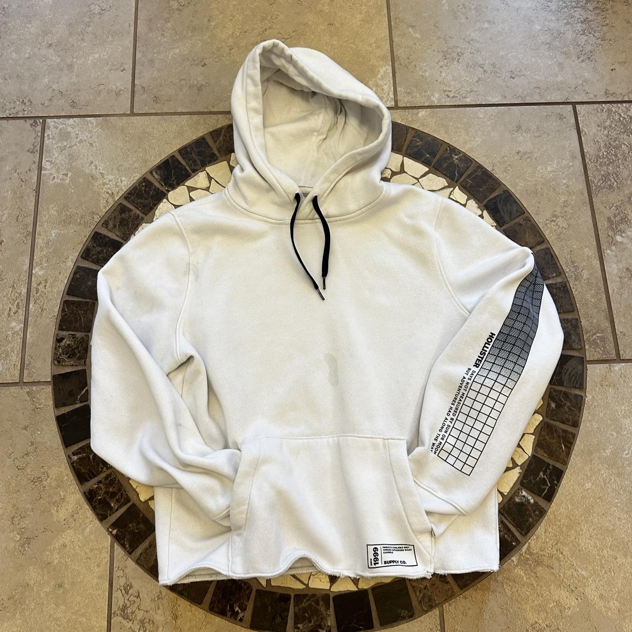 Old Hollister White and black hoodie with a unique. Depop